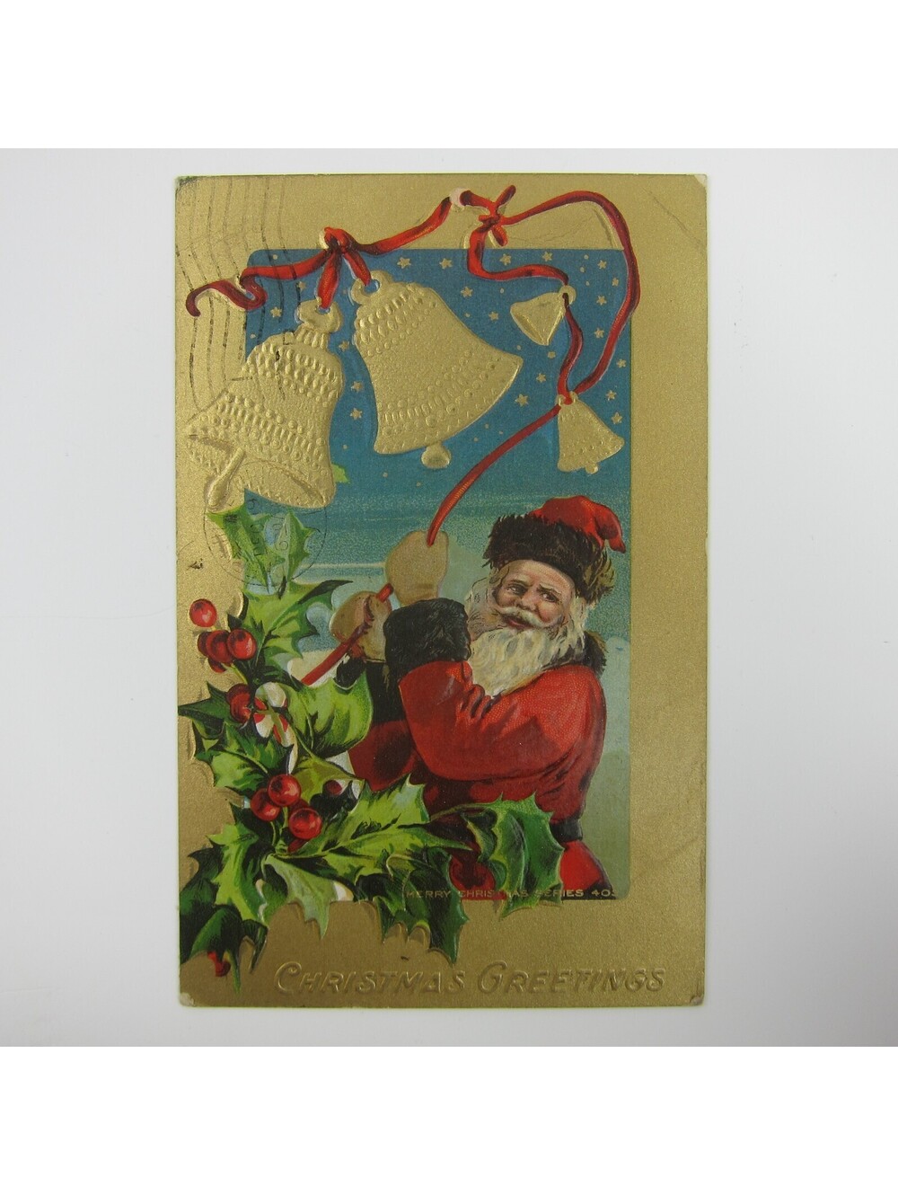 Christmas Postcard Santa Rings Bells Gold Embossed Holly Berries Antique 1910